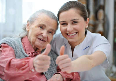 elder woman with caregiver