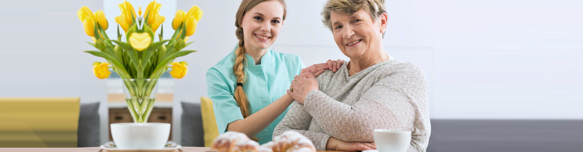 happy caregiver and senior woman